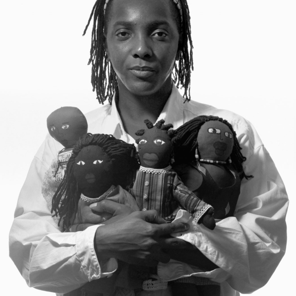 Man with Doll Collection